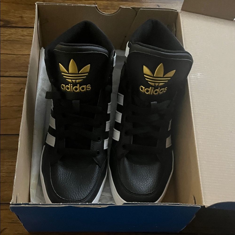Adidas Black and Gold Sneakers with White Stripes